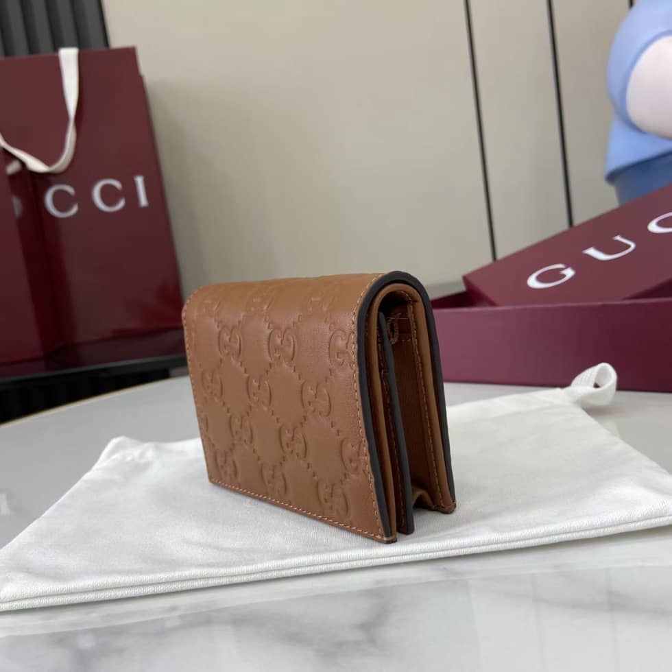 Gucci GG Emblem Bifold Brown Wallet 847207_2_157920 Gucci GG Emblem Bifold Brown Wallet 847207