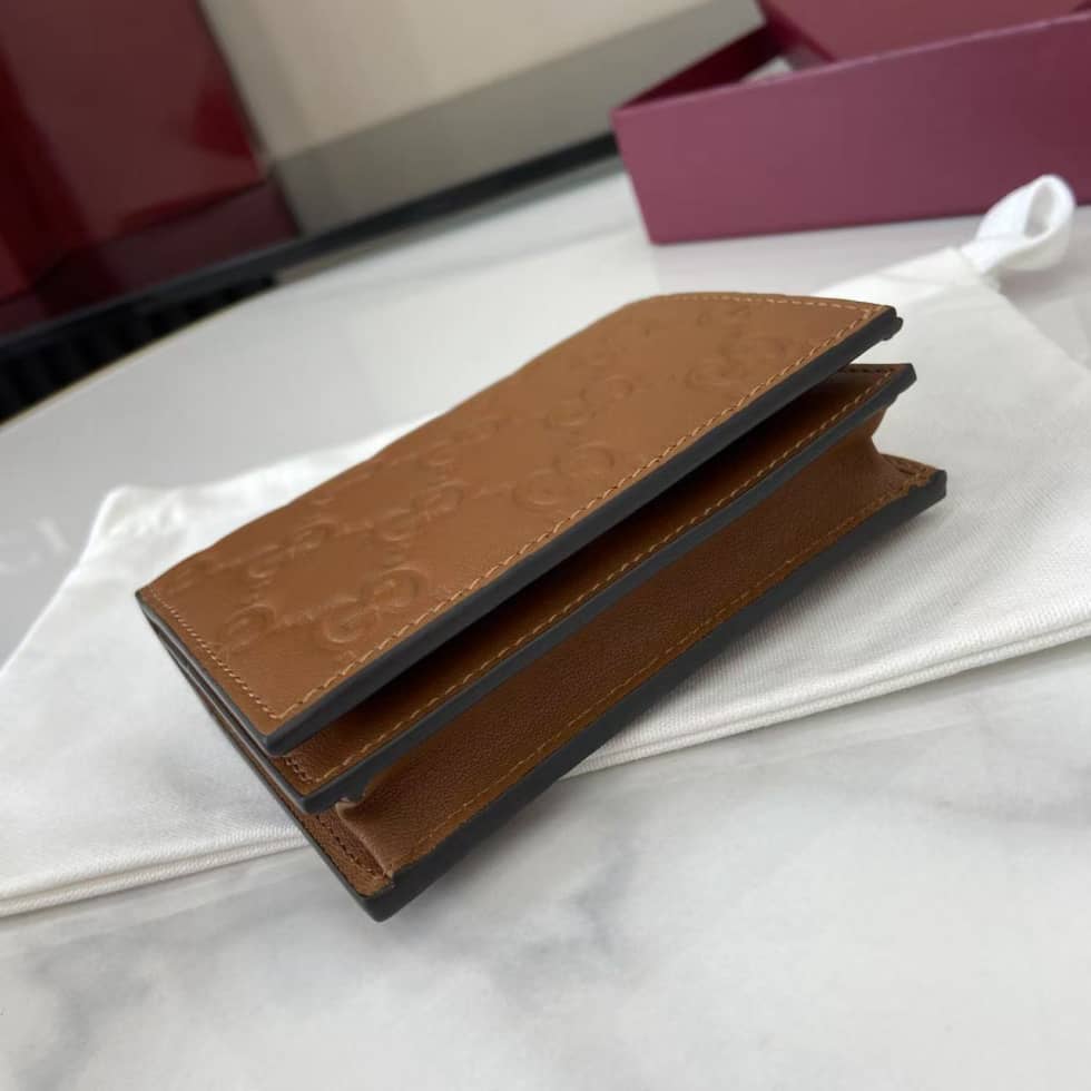 Gucci GG Emblem Bifold Brown Wallet 847207_3_157920 Gucci GG Emblem Bifold Brown Wallet 847207