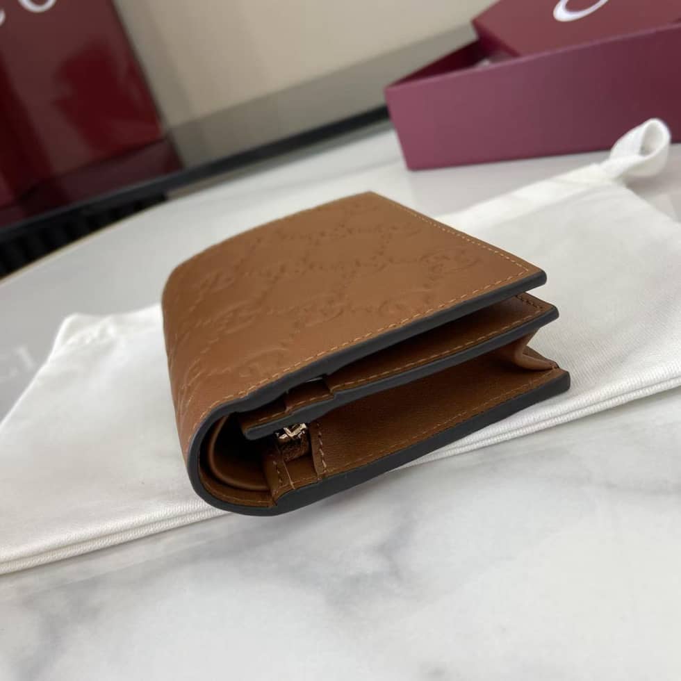 Gucci GG Emblem Bifold Brown Wallet 847207_4_157920 Gucci GG Emblem Bifold Brown Wallet 847207