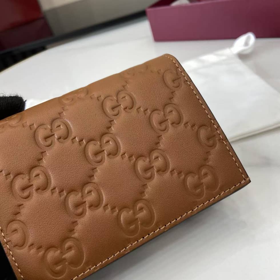 Gucci GG Emblem Bifold Brown Wallet 847207_5_157920 Gucci GG Emblem Bifold Brown Wallet 847207