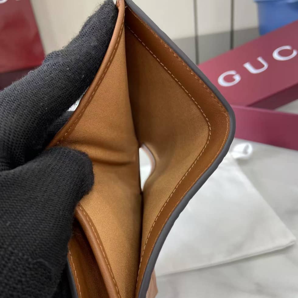 Gucci GG Emblem Bifold Brown Wallet 847207_7_157920 Gucci GG Emblem Bifold Brown Wallet 847207