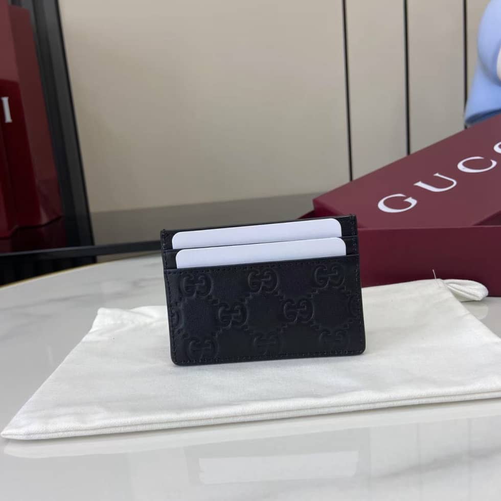 Gucci GG Emblem Embossed Leather Black Card Case_1_157950 Gucci GG Emblem Embossed Leather Black Card Case