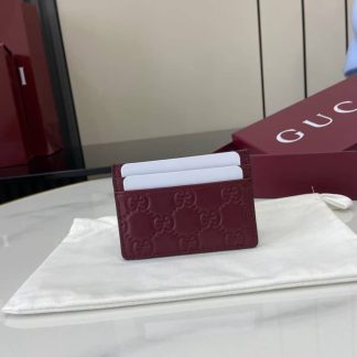 Gucci GG Emblem Embossed Leather Red Card Case