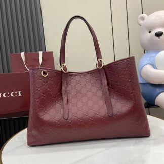 Gucci GG Emblem Embossed Large Red Tote Bag